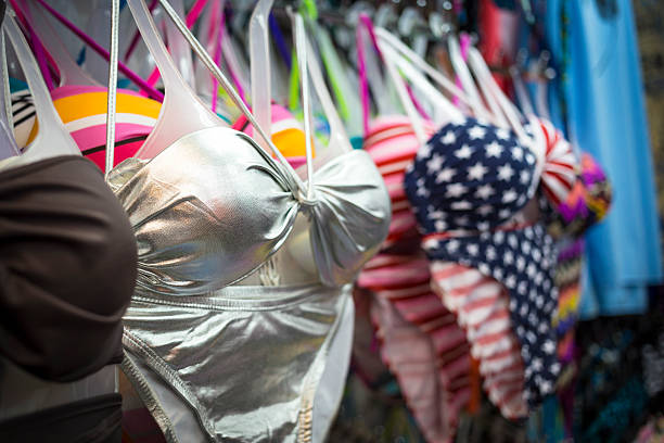 Bkinis in a stall on a night market in Pattaya, Thailand. Artificial light, shallow DOF, Adobe RGB.
